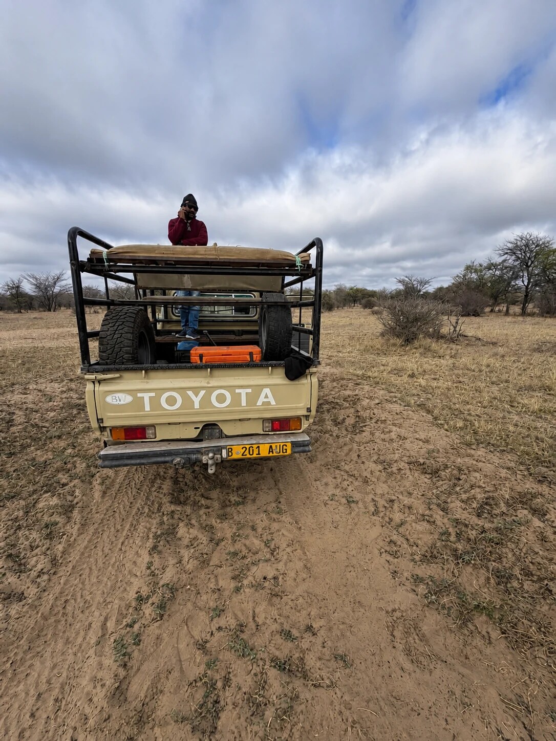Safari vehicle travelling through the Botswana hunting area
