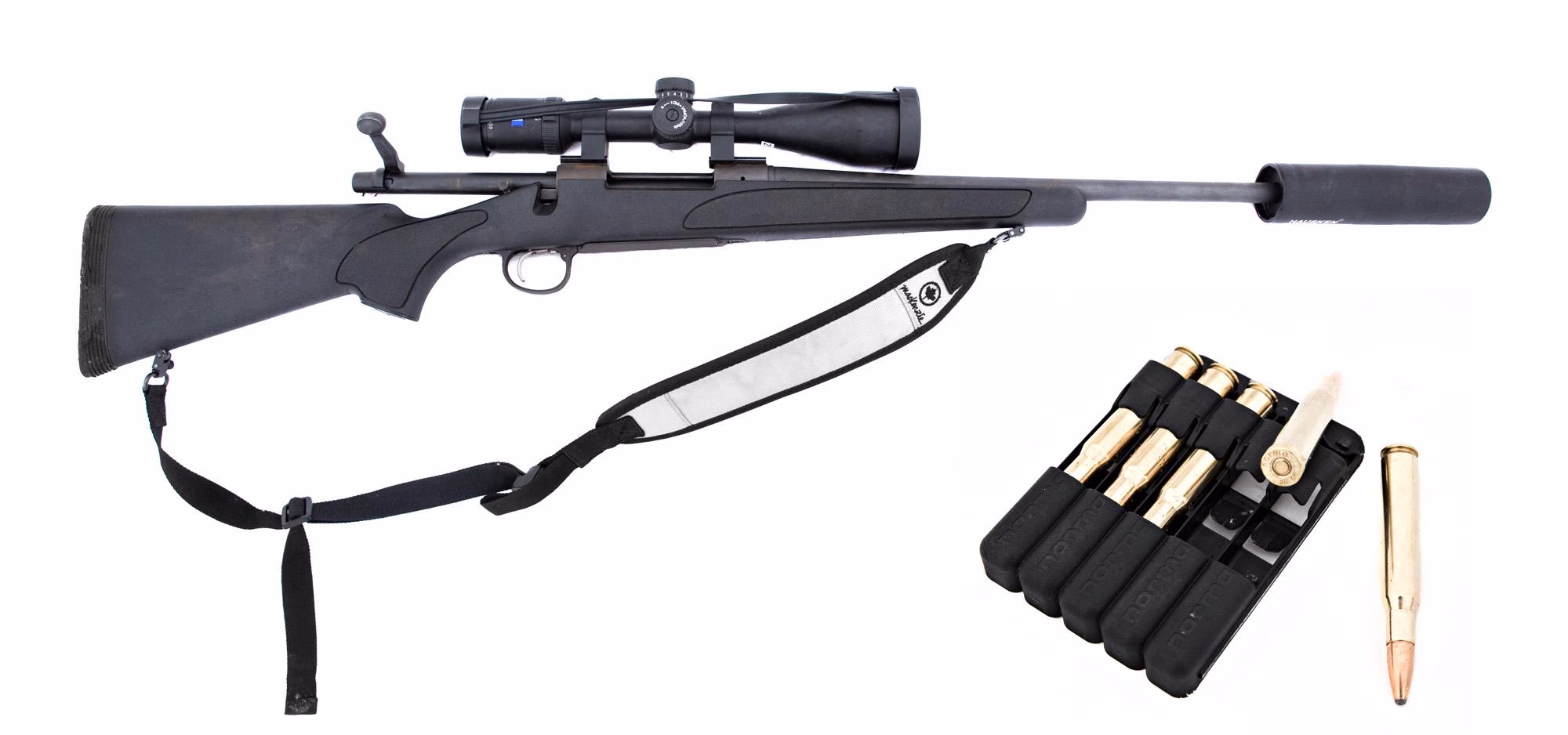 Scoped Remington Model 700 hunting rifle on a field rest